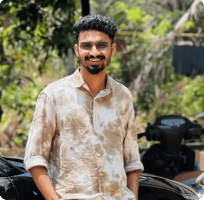 Smiling man with glasses and beard