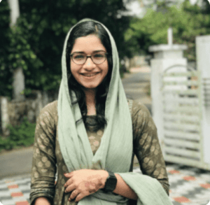 Girl with glasses and henna on hand