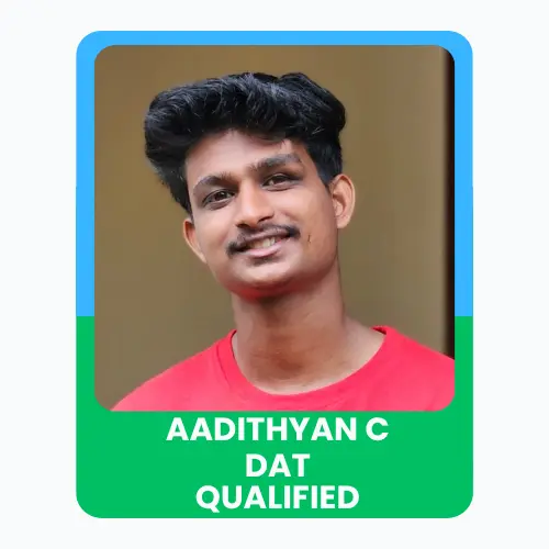 Portrait of Aadithyan c with a “DAT Qualified” achievement banner.