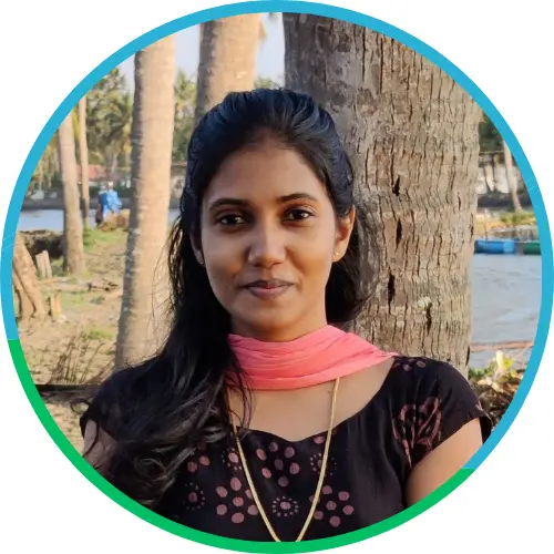 Portrait of a smiling young woman in traditional attire with a confident and approachable look, framed in a circular design.
